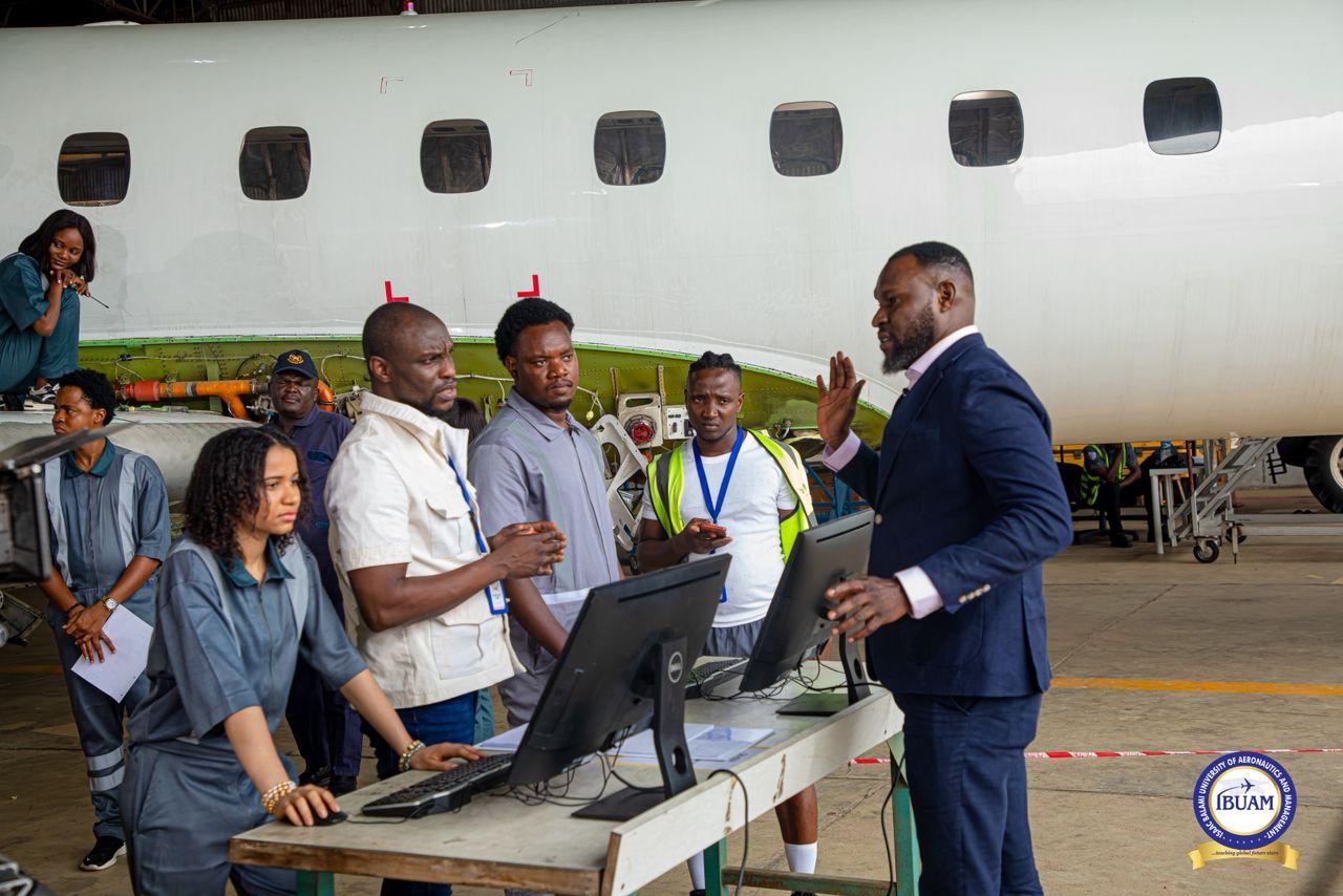 Engr. Isaac Balami inspecting engineering schematics in 7Star Hangar